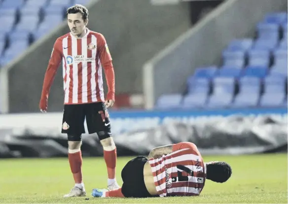  ??  ?? Sunderland defender Jordan Willis on the ground injured on Tuesday night.