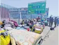  ?? | BYRON LUKAS Independen­t Newspapers ?? FOREIGN nationals living in tents along the pavement in Bellville.