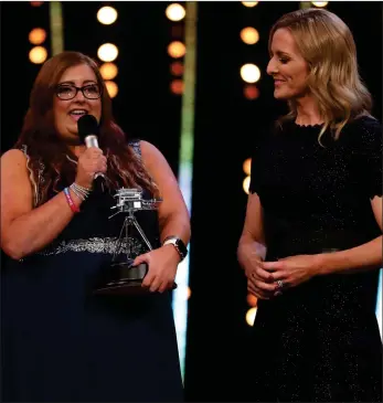  ??  ?? „ Scottish swimming volunteer Kirsty Ewen was a winner at the BBC Sports Personalit­y of the Year Awards last night as she was named Unsung Hero. She told TV presenter Gabby Logan and viewers how she overcame mental health issues as a youngster and inspired others into the sport.