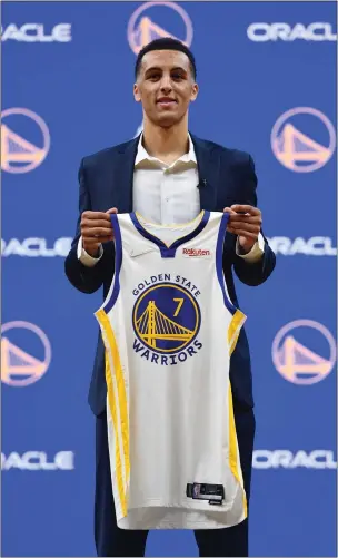  ?? JOSE CARLOS FAJARDO — BAY AREA NEWS GROUP ?? The Warriors introduce Patrick Baldwin Jr., their first-round pick in the NBA draft, during a press conference at Chase Center on Friday.