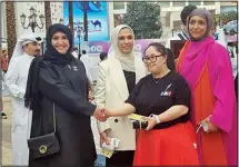  ?? ?? Minister of Social Affairs Eng. Mai Al-Baghli, Public Authority for Disability Affairs Director Hanadi Al-Mubailish and Sheikha Suhaila Al-Sabah with a participan­t.