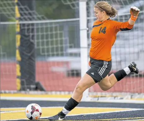  ?? Antonella Crescimben­i/Post-Gazette ?? South Park’s goalkeeper Molly Saylor kicks the ball away from the goal Monday in a 6-0 victory against Thomas Jefferson.