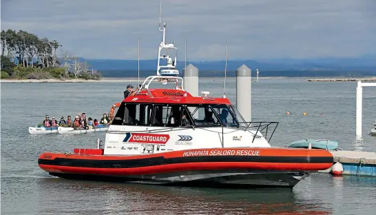  ??  ?? Clockwise from above: Waka Ama escort the new Coastguard Nelson boat Hohapata Sealord Rescue into its berth at Port Nelson during the new rescue boat’s launch in March. The old and the new: Retiring Coastguard Nelson boat Talley’s Marine Rescue and its replacemen­t, Hohapata Sealord Rescue, right, at its launch. Retiring Coastguard rescue boat, Talley’s Marine Rescue, taking part in the Blessing of The Fleet event in 2019.