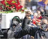  ?? PHOTO: JERRY HOLT / STAR TRIBUNE VIA AP ?? March: Protesters take part in a rally to mourn George Floyd on Sunday in Minneapoli­s.