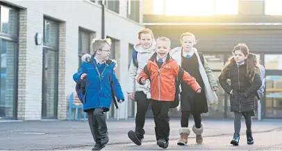  ?? Pictures: PA/Mhairi Edwards. ?? Top right: First Minister Nicola Sturgeon, speaking at the Scottish Parliament, announces the fulltime reopening of schools, which will see all pupils – including this group from Muirfield Primary in Arbroath, above – return to classes from August 11.