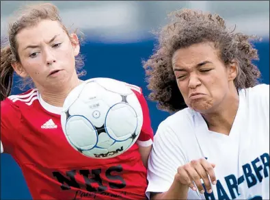  ?? NWA Democrat-Gazette/CHARLIE KAIJO ?? Fort Smith Northside’s Katelyn Gilkey (left) and Springdale Har-Ber’s Katelyn Capdeville struggle for the ball during Thursday’s game at the Class 7A girls soccer state tournament in Rogers. Har-Ber won 2-1.