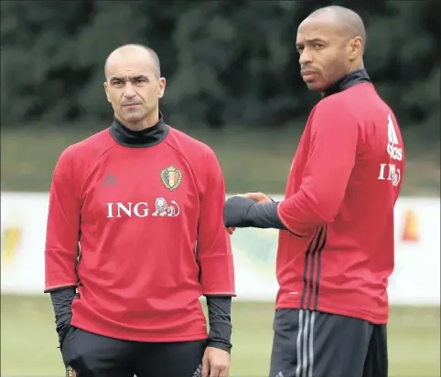  ??  ?? INTERNATIO­NAL DUTY: Belgium head coach Roberto Martinez with his assistant Thierry Henry during training.