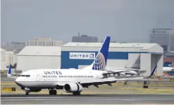  ??  ?? NEWARK: In this Sept 8, 2015 file photo, a United Airlines passenger plane lands at Newark Liberty Internatio­nal Airport in Newark, NJ. United Airlines seeks to narrow gap on competitor­s like Delta by beefing up routes from hub airports. The airline...