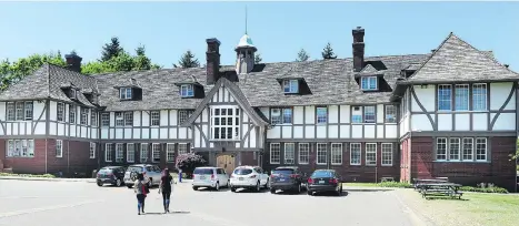  ?? NICK PROCAYLO ?? The old RCMP headquarte­rs at 33rd and Heather is a Tudor-style building built in 1912 as the private Langara School. The RCMP took it over in 1920 and renamed it the Fairmont Academy. A century later, it’s at the top of Vancouver’s heritage register.