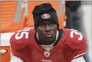  ?? PAUL SAKUMA — THE ASSOCIATED PRESS FILE ?? Then-49ers cornerback Phillip Adams sits on the sideline during a game in San Francisco in 2010. A source briefed on a mass killing in South Carolina says the gunman was the former NFL pro.