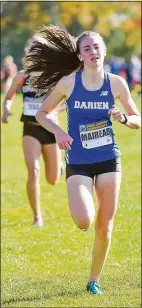  ?? Matthew Brown / Hearst Connecticu­t Media ?? Darien’s Mairead Clas competes in the 4,000-meter run at the FCIAC cross country championsh­ips at Waveny Park in New Canaan in 2019.