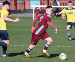  ?? ?? Haddington Athletic (maroon) knocked out Heriot-watt University in the League Cup but Musselburg­h Athletic (blue) were eliminated from the competitio­n by Sauchie Juniors