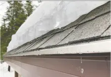  ?? PHOTOS: STEVE MAxwELL ?? Aluminum heating plates under the roof edge keep it clear of ice and allows rooftop meltwater to run down freely.