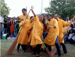  ?? — G.N. JHA ?? Students take part in a street play organised by the Union ministry of consumer affairs at the Boat club in New Delhi on Tuesday.