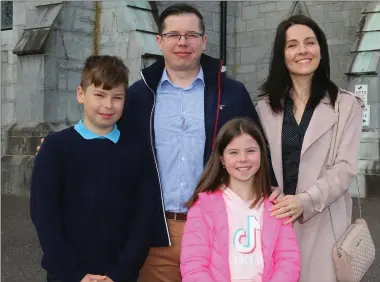  ??  ?? Greg and Anita Muzyk, with their children Maja and Mikolaj were delighted to be able to go to attend Mass at the Church of the Immaculate Conception, Kanturk, last Sunday.