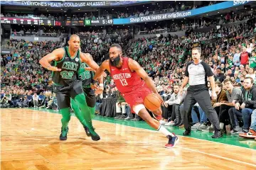  ?? - AFP photo ?? James Harden #13 of the Houston Rockets handles the ball against the Boston Celtics on March 3, 2019 at the TD Garden in Boston, Massachuse­tts.