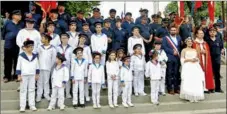  ?? - Crédits : EBO ?? Les marins et officiels apres la be?ne?dictions des eaux et lhommage aux marins disparus