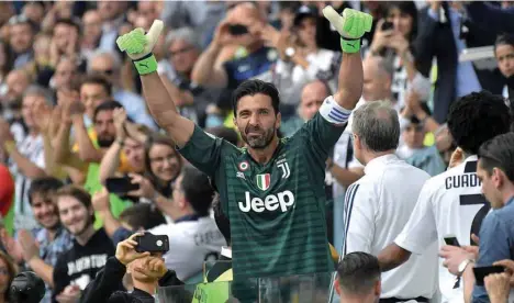  ?? (AFP) ?? Gianluigi Buffon, 42, signed a one-year contract extension that will keep him at Juventus until the end of next season.