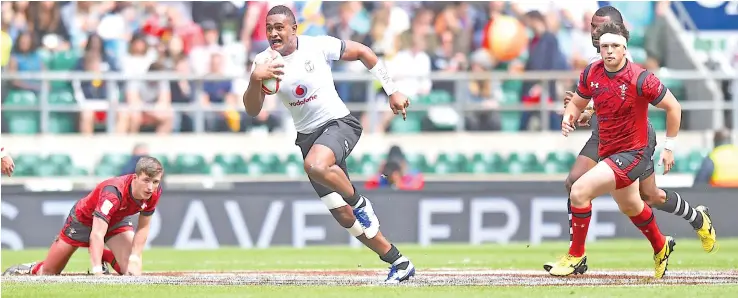  ?? Photo: Ian Muir ?? Vodafone Fijian 7s rep Viliame Mata sprints to the score line against Wales during the London 7s pool games yesterday.