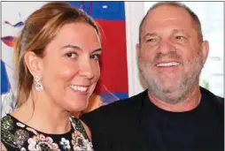  ??  ?? ALL SMILES:
With Hollywood mogul Harvey Weinstein, before he was exposed as a rapist