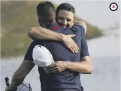  ??  ?? Justin Rose and Henrik Stenson embrace after their win over Dustin Johnson and Rickie Fowler.