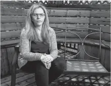  ?? TONY CALDWELL /POSTMEDIA NETWORK ?? Rebecca Tiessen poses for a photo at her house in Ottawa. Rebecca’s mother died April 12 of COVID complicati­ons and did not have a chance to say goodbye.