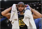  ?? JOSE CARLOS FAJARDO — BAY AREA NEWS GROUP ?? Golden State Warriors' Stephen Curry (30) walks on the court after winning the NBA Western Conference Finals at the Chase Center in San Francisco on Thursday. The Golden State Warriors defeated the Dallas Mavericks 120-110.