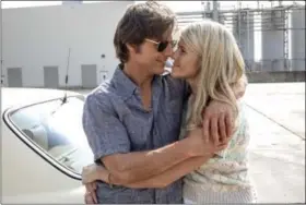  ?? DAVID JAMES/UNIVERSAL PICTURES VIA AP ?? This image released by Universal Pictures shows Tom Cruise, left, and Sarah Wright Olsen in a scene from “American Made.”