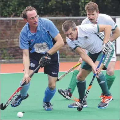  ?? Picture: Chris Davey FM4578929 Buy this picture from kentonline.co.uk ?? Herne Bay over-40s on the ball during their England Hockey National Over-40s cup clash against Canterbury on Sunday