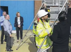  ?? Picture: Martin Apps FM4705931 ?? Amber Rudd watches training in action at Concept Training in Ashford