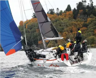  ?? ?? Sailing in the Pacific Northwest, such as in the Grand Prix (above), often requires some pretty tough foulies. David Schmidt tested the Meris jacket during the Round the County race.