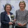  ?? ?? Linda Hunt receives her trophies from Cilla Osgood