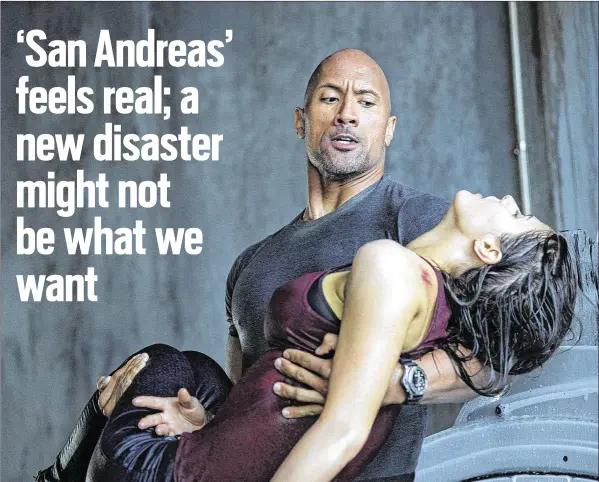  ?? JASIN BOLAND / WARNER BROS. PICTURES ?? Dwayne Johnson, (left), as Ray, and Alexandra Daddario, as Blake, in a scene from the action thriller,“San Andreas.”