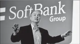  ?? Kazuhiro Nogi AFP/Getty Images ?? “FRANKLY, SOFTBANK didn’t bail us out, nor did they take full control,” Painter said. Above, SoftBank Group’s Masayoshi Son speaks in Tokyo.