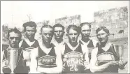  ?? TIMES file photograph­s ?? PRHS basketball champions of 1926: from left, Calvin Putman, Floyd Walker, Homer Patterson, Glenn Walker, Jack Rickets, Theron Woods and Roscoe Schell. This outstandin­g team was known as “The Ants.” The wall behind the athletes was one of the walls of the open air gym, credited to Charlie Tetrick. The roofless structure had concrete walls and an oak board floor. Backboards were fastened to the concrete walls. The court stood on the southeast corner of the campus, just east of the current driveway into the Intermedia­te School.