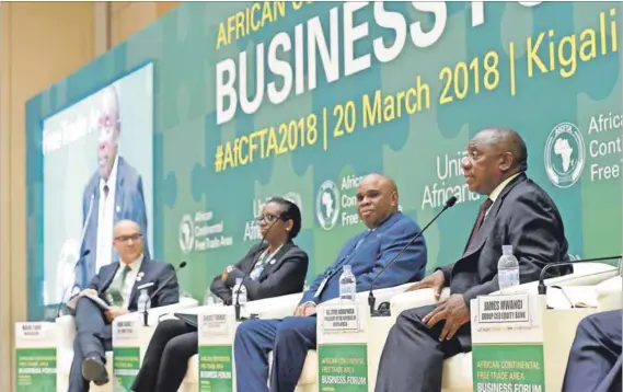  ??  ?? Continent without borders: President Cyril Ramaphosa (right) endorsed the trade agreement that does away with cross-boundary tariffs and the free movement of people within Africa. But realising this dream will be a slow process with many hurdles....