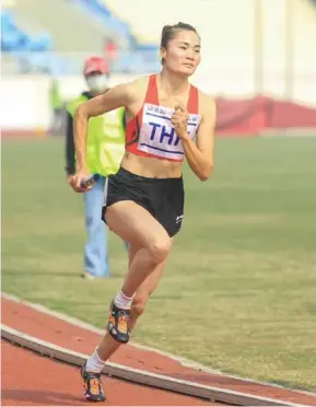  ?? Photo laodong.vn ?? LEADING THE WAY: Runner Quách Thị Lan will light the torch at the opening ceremony of the 31st SEA Games.
