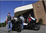  ?? BILL UHRICH — MEDIANEWS GROUP ?? Richard W. Storms, left, Glen A. Houck and Victor M. Frederick III, members of the Hiram Scottish Riders Motorcycle Club, are ready to leave the Scottish Rite Cathedral in West Reading on Friday for a 30-day, 11,200mile motorcycle ride to raise funds for the Children’s Dyslexia Center of Reading.