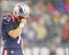  ?? Adam Glanzman / Getty Images ?? Jake Bailey of the Patriots reacts to a missed field goal that could have won the game against the Bucs.