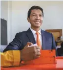  ?? GIANLUIGI GUERCIA AGENCE FRANCE-PRESSE ?? Andry Rajoelina, au moment de voter le 19 décembre