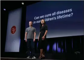  ?? AP Photo/Jeff Chiu, File ?? Giving: In this Sept. 20, 2016, file photo, Facebook CEO Mark Zuckerberg and his wife, Priscilla Chan, prepare for a speech in San Francisco. The Giving USA report, released Tuesday said giving from individual­s, estates, foundation­s and corporatio­ns...