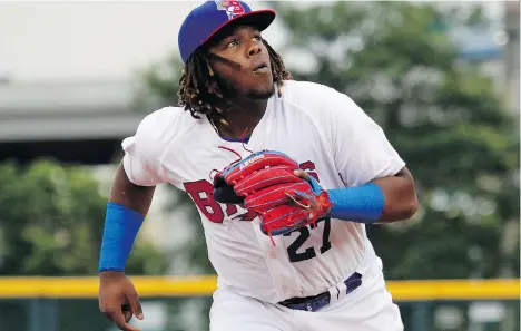  ?? JEFFREY T. BARNES/THE ASSOCIATED PRESS ?? The Buffalo Bisons’ Vladimir Guerrero Jr. chases a foul ball during the first inning of his Triple-A debut with the Toronto Blue Jays affiliate on Tuesday in Buffalo N.Y. Guerrero walked three times in his first three plate appearance­s, scored two...