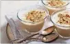  ?? CONTRIBUTE­D BY DEB LINDSEY /THE WASHINGTON POST ?? Maple-kissed pudding, layered with sliced banana and topped with a crunch of graham cracker crumbles.