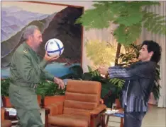 ?? (AFP) ?? Cuban President Fidel Castro plays football with Diego Armando Maradona, during the recording of Maradona’s TV program “The 10’s Night” in Havana on October 26, 2005.