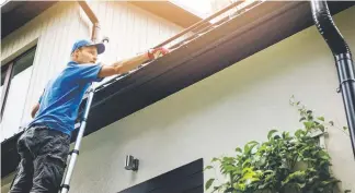  ??  ?? Gutters help drain water from the roof of your house. Clean the gutters while it’s still mild outside.