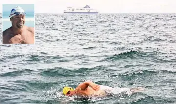  ??  ?? PUSHING AHEAD: Howard Warrington, inset, swims across the English Channel, a long-time dream.