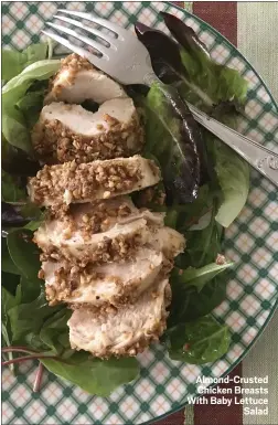  ??  ?? Almond-Crusted Chicken Breasts With Baby Lettuce Salad