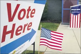  ?? CHARLIE RIEDEL — THE ASSOCIATED PRESS ?? A voting location is shown inMission, Kan.