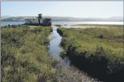  ?? ALAN DEP — MARIN INDEPENDEN­T JOURNAL ?? A small stream from Inverness Ridge flows past the Point Reyes shipwreck in Inverness. The Inverness Public Utility District, which uses water off Inverness Ridge for its drinking water supply, plans on declaring a water shortage emergency on July 22.