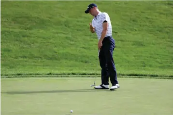  ?? AP Photo/Darron Cummings ?? ■ Justin Thomas reacts to missing his birdie putt on the 18th green Saturday during the third round of the Workday Charity Open golf tournament, in Dublin, Ohio.